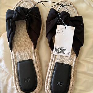 Women's Black and Tan Bow Flats